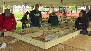 Zuern employees helping build playground