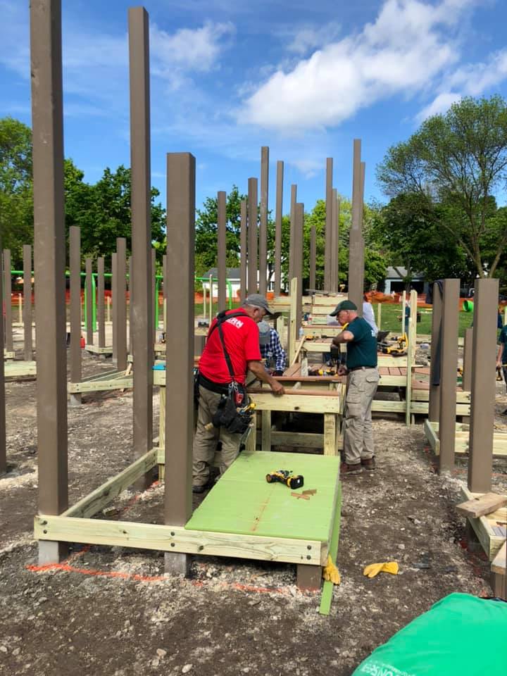 Zuern employees helping build playground