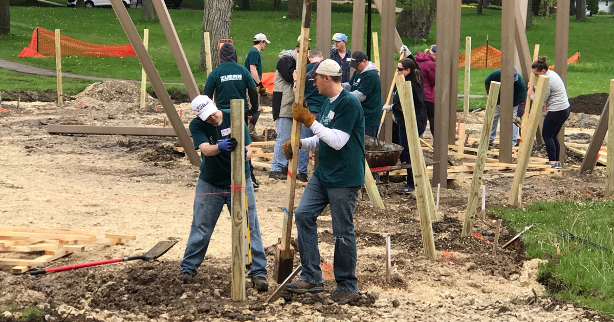 Zuern employees helping build playground