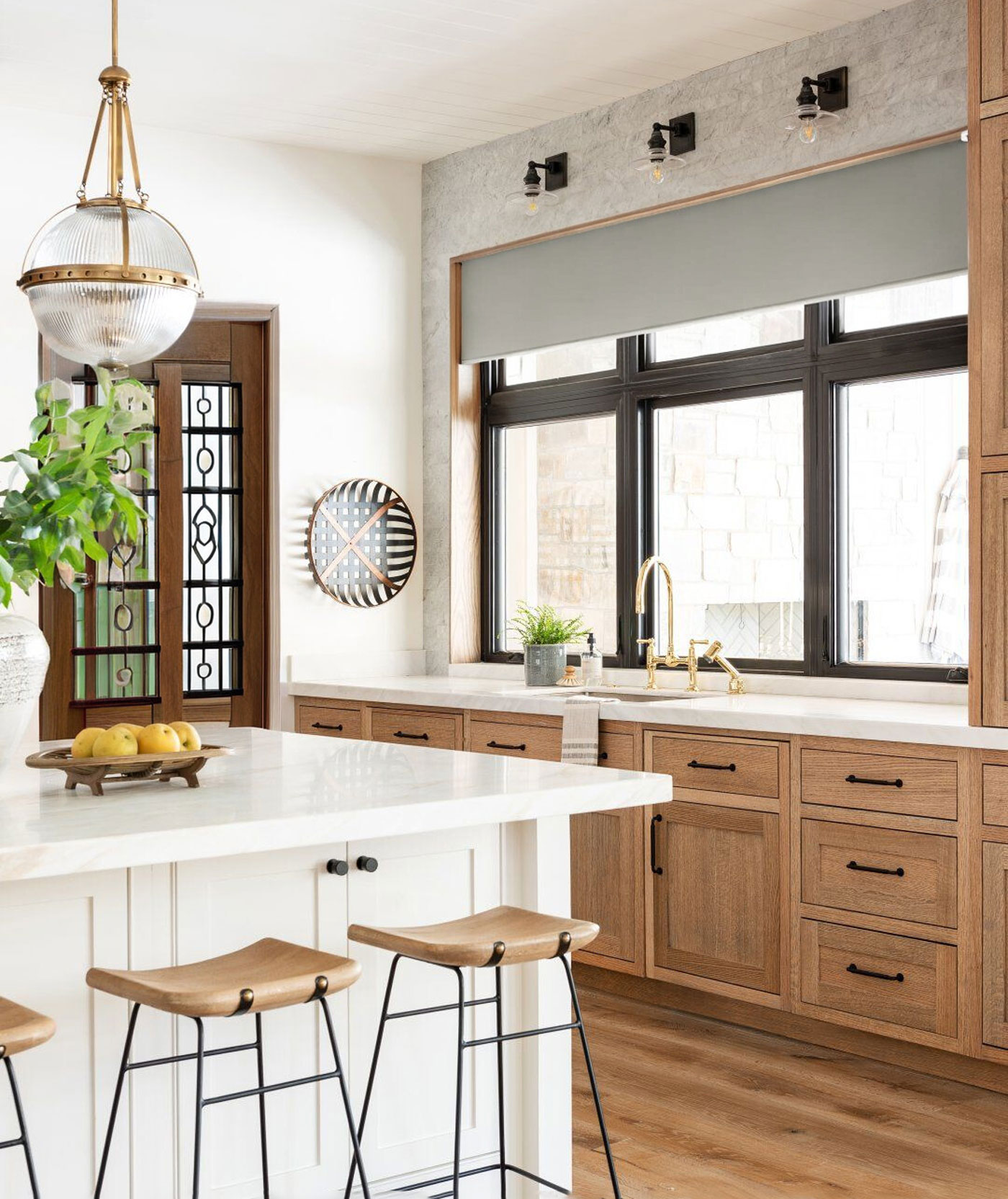 home interior with wood cabinets and black window panes