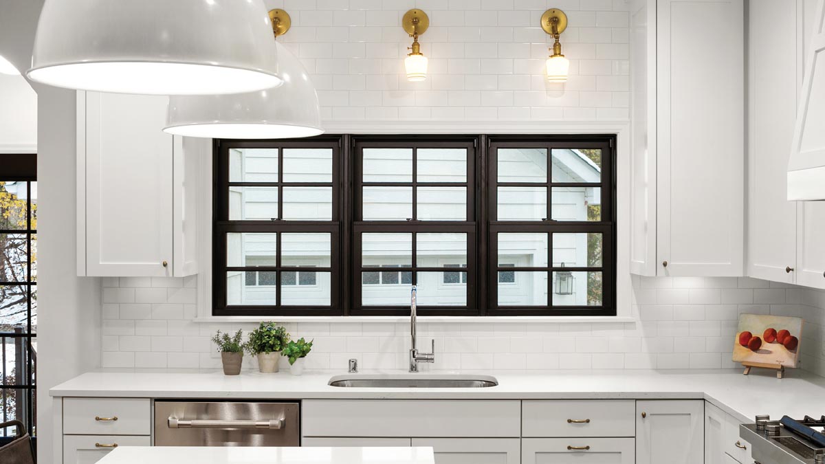 white kitchen with black marvin windows