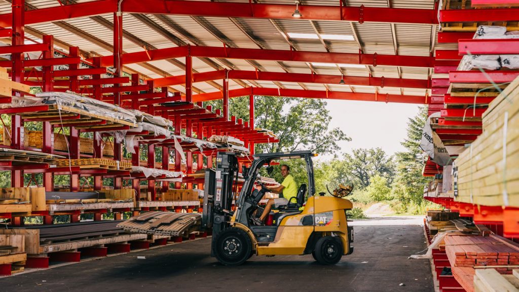 Zuern employee using forklift