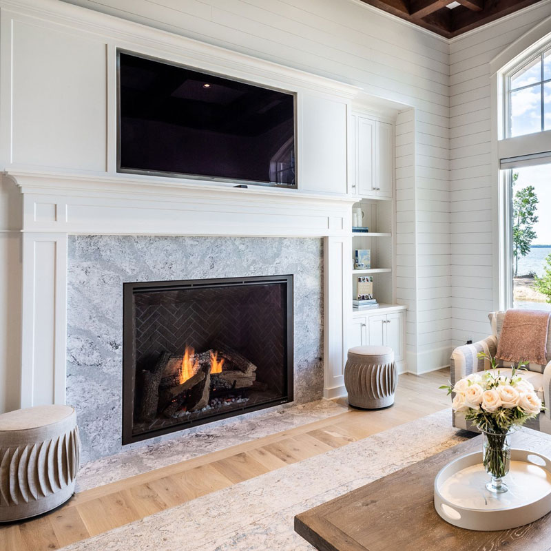 living room with Cambria quartz fireplace mantel