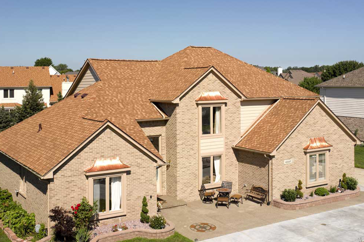 brick home with Certainteed roof