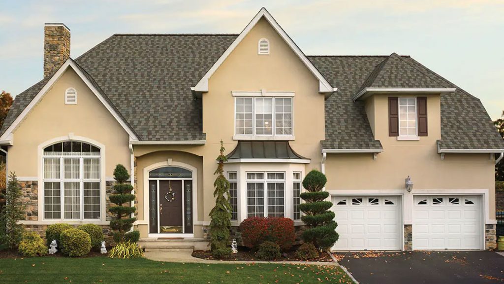 tan home with GAF roof