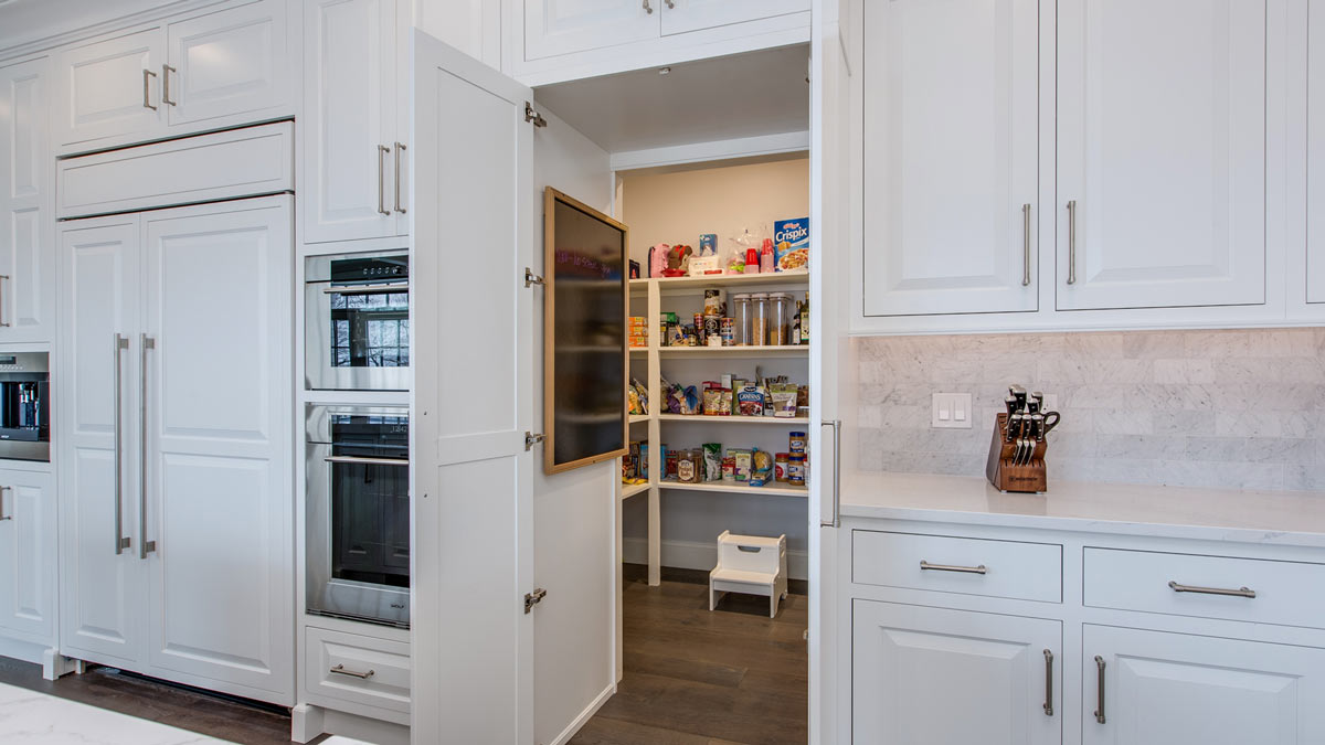 white kitchen with walk-in pantry